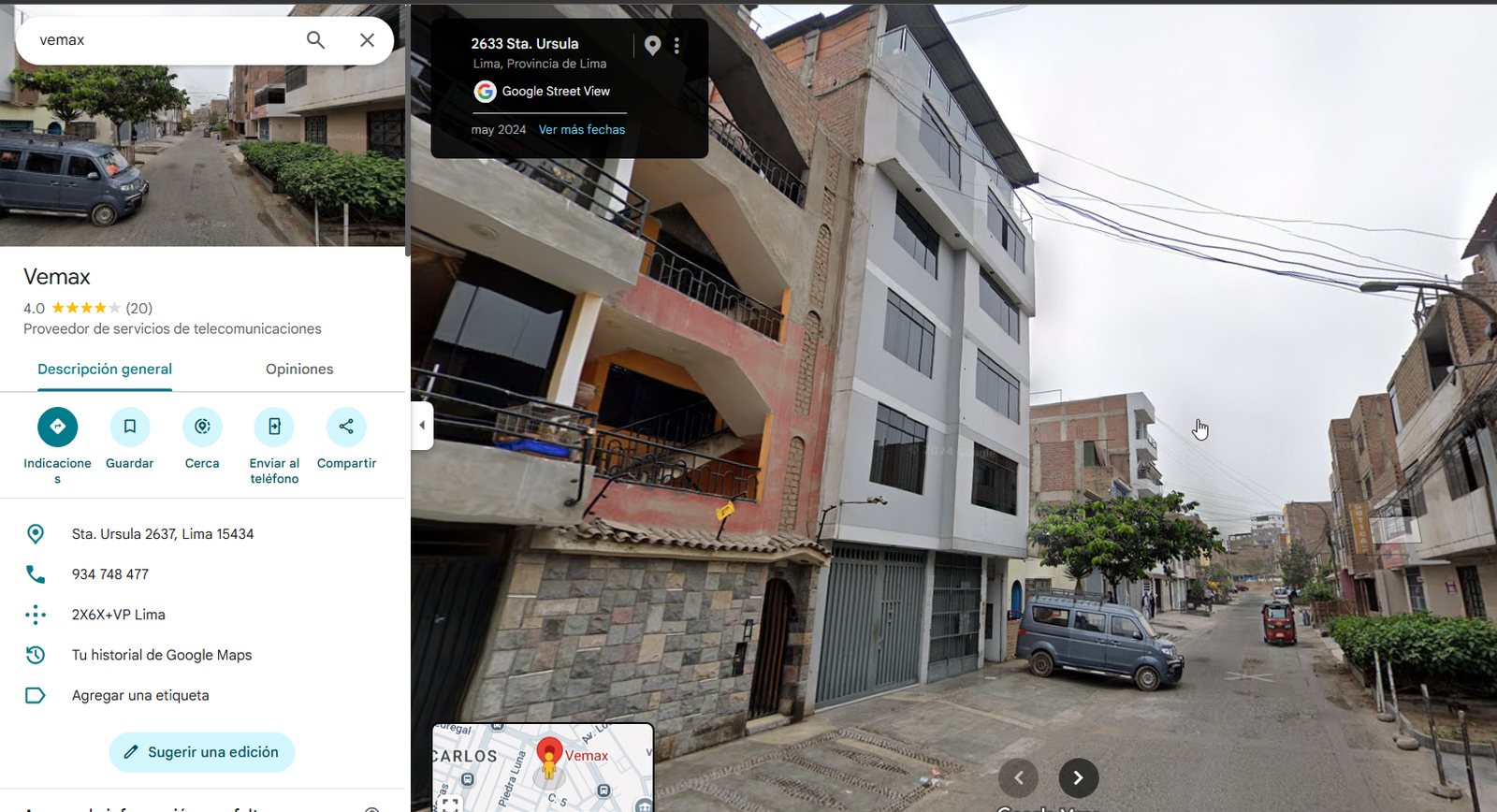 Fachada y calle del lugar de encuentro — Vemax